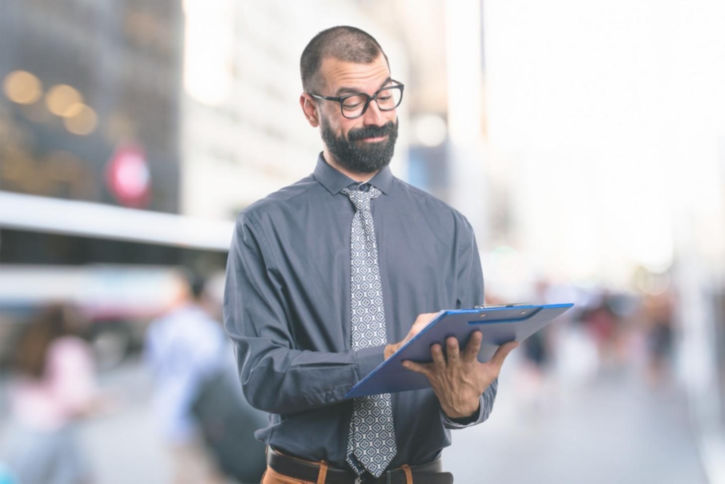 Professional reviewing financial documents and calculations
